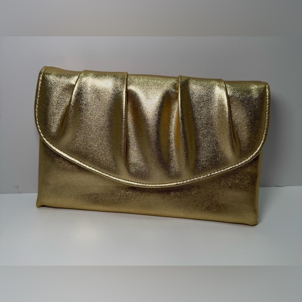 Vintage 1978 Avon Polished Gold Metallic clutch